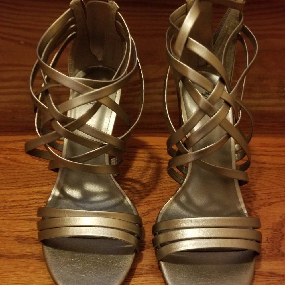 Woman's Silver Strappy 3 1/2" Heel sandal Size 6.  Hardly worn.